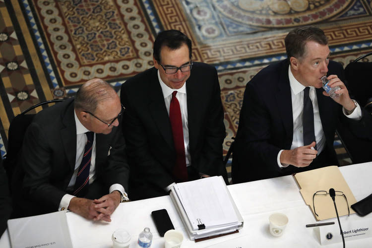 White House economic adviser Larry Kudlow, Treasury Secretary Steve Mnuchin and U.S. Trade Representative Robert Lighthizer attend a meeting in late February of senior U.S. and Chinese officials to resume trade negotiations in Washington. (Jacquelyn Martin/AP)  