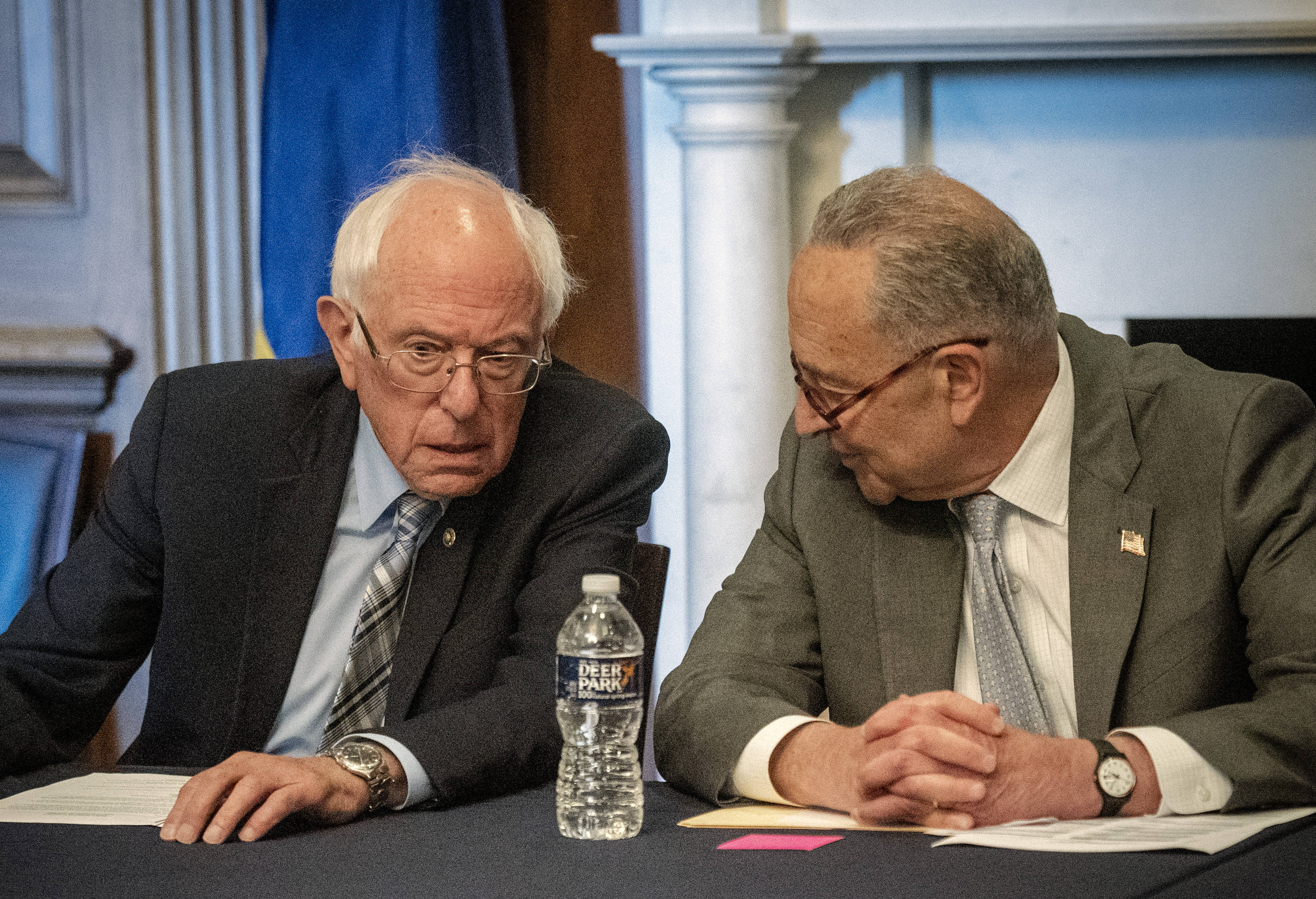 Senate Majority Leader Charles E. Schumer (D-N.Y.), right, and Sen. Bernie Sanders (I-Vt.), before a meeting with Senate Budget Committee Democrats on Wednesday at the Capitol.