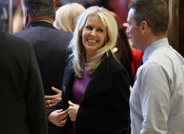 Monica Crowley leaves Trump Tower last month. (Evan Vucci/AP)</p>  