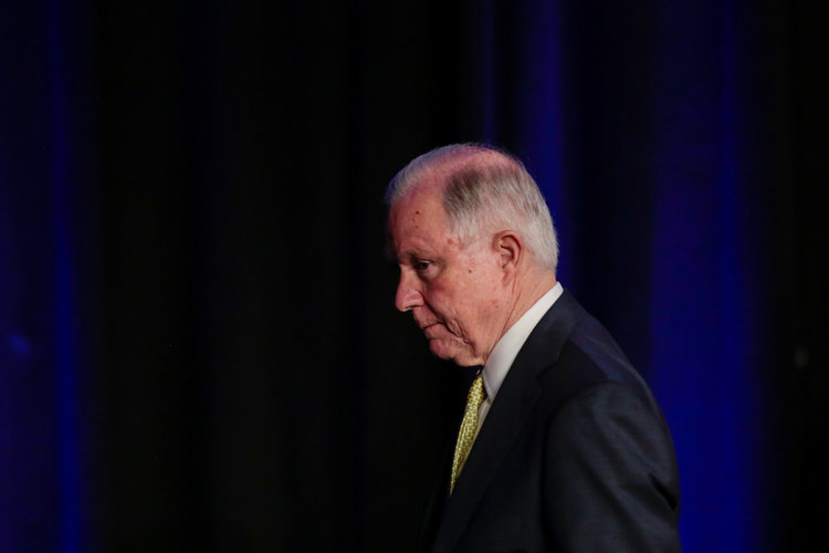Jeff Sessions makes his way off stage after addressing the National Law Enforcement Conference on Human Exploitation in Atlanta this week.&nbsp;(Chris Aluka Berry/Reuters)</p>  