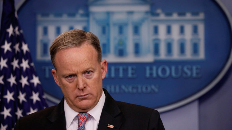 Sean Spicer listens to a reporter's question during his daily briefing yesterday. (Jonathan Ernst/Reuters)</p>  
