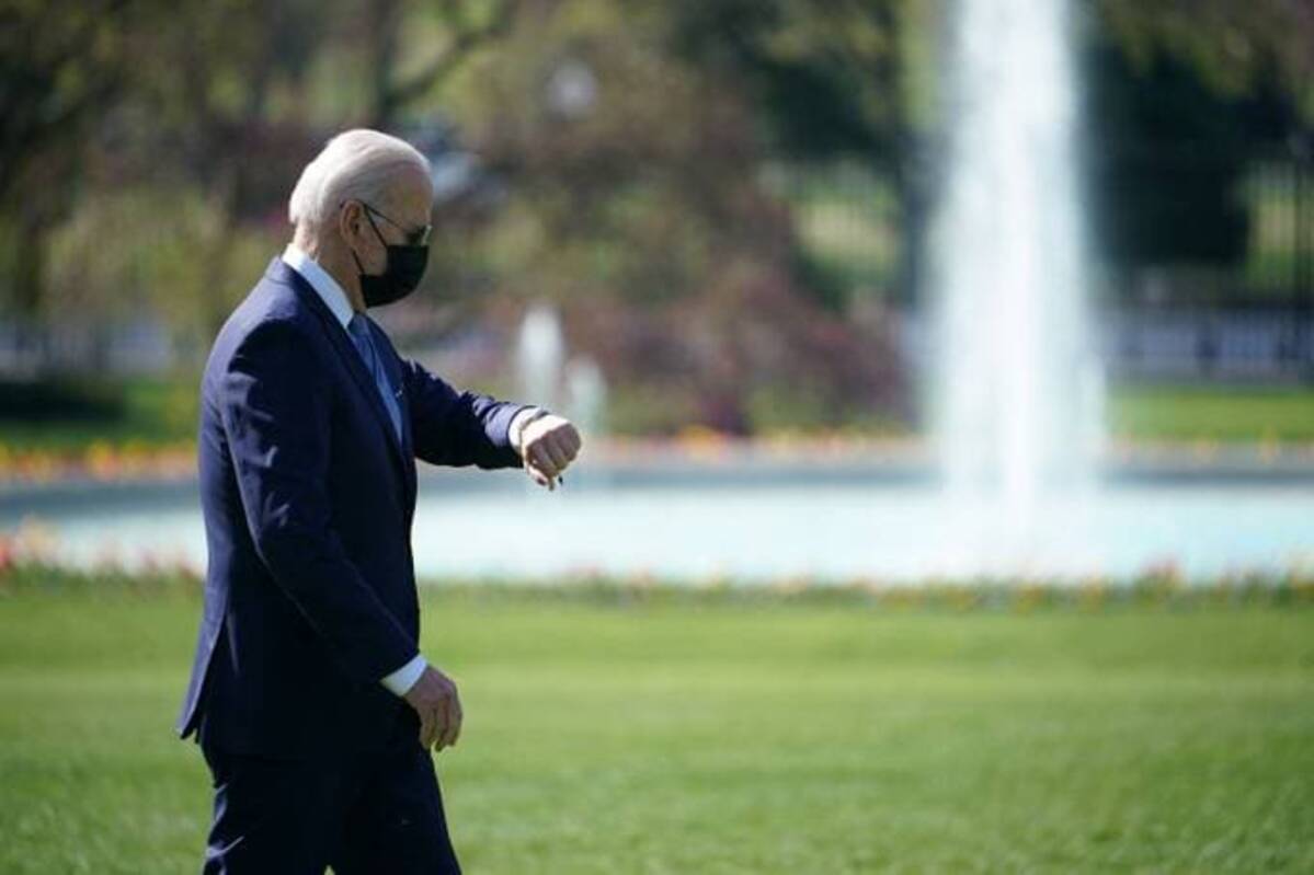 Biden walks across the South Lawn upon returning to the White House on Monday. (Mandel Ngan/AFP/Getty Images)
