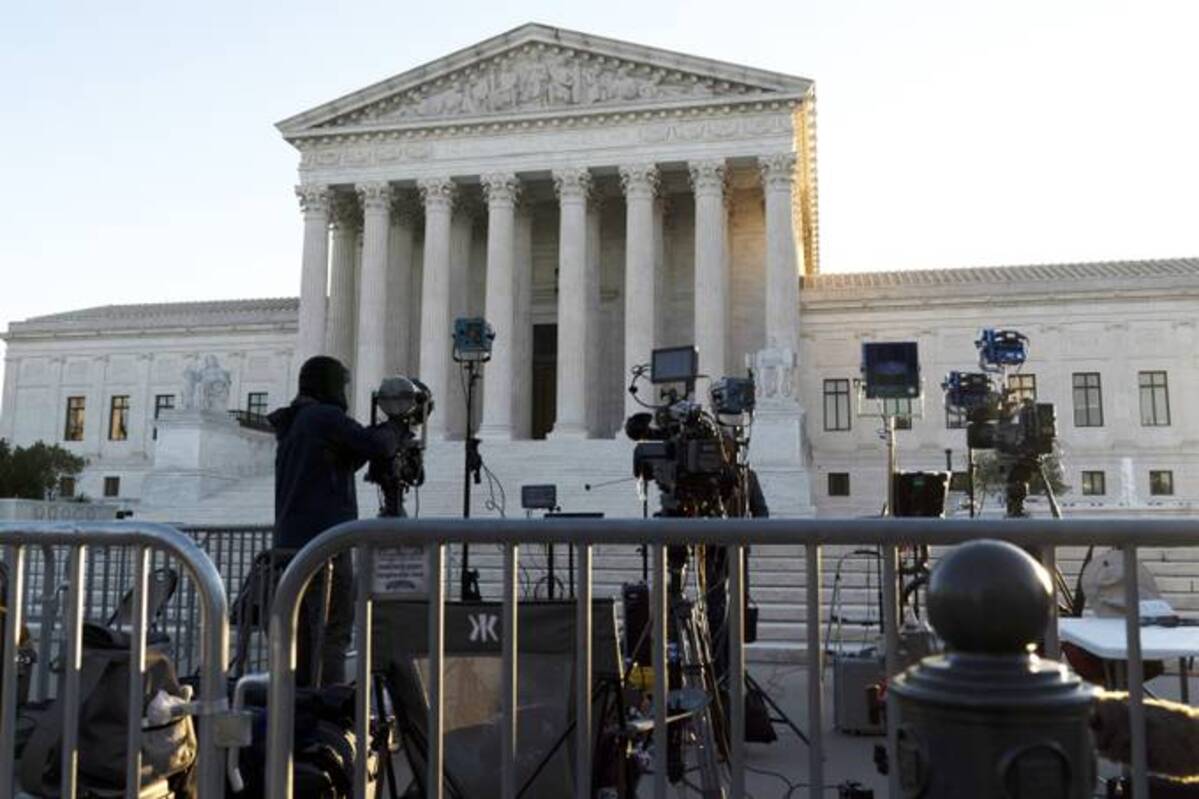 The U.S. Supreme Court is seen on Capitol Hill in Washington on Wednesday as television cameras are set up. (Jose Luis Magana/AP)