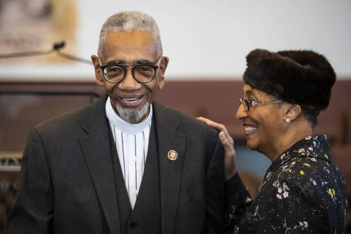 Rep. Bobby Rush (D-Ill.) poses for a photo with his wife, Paulette Holloway, after announcing he will not seek a 16th term in the House. (Ashlee Rezin/Chicago Sun-Times via AP)