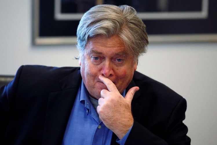 Trump's new "Campaign CEO"&nbsp;Stephen Bannon listens to Trump talk at Trump Tower yesterday. (Carlo Allegri/Reuters)</p>  