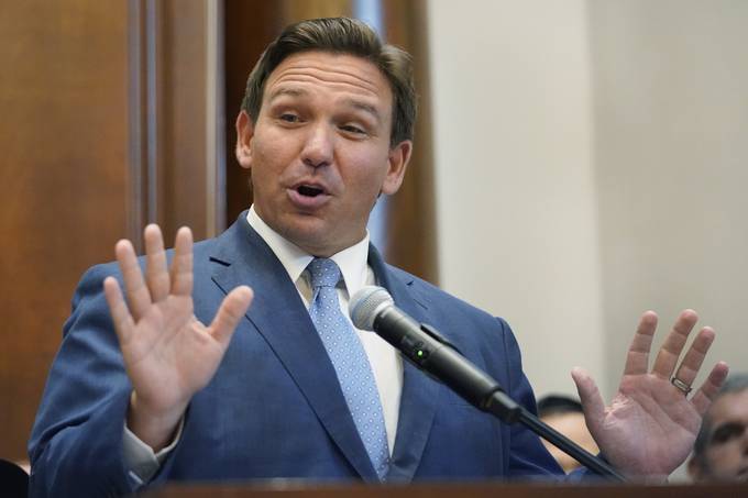 Florida Gov. Ron DeSantis speaks. He plans to appeal a federal judge's decision to block a law that would have fined social media companies. (AP Photo/Wilfredo Lee)