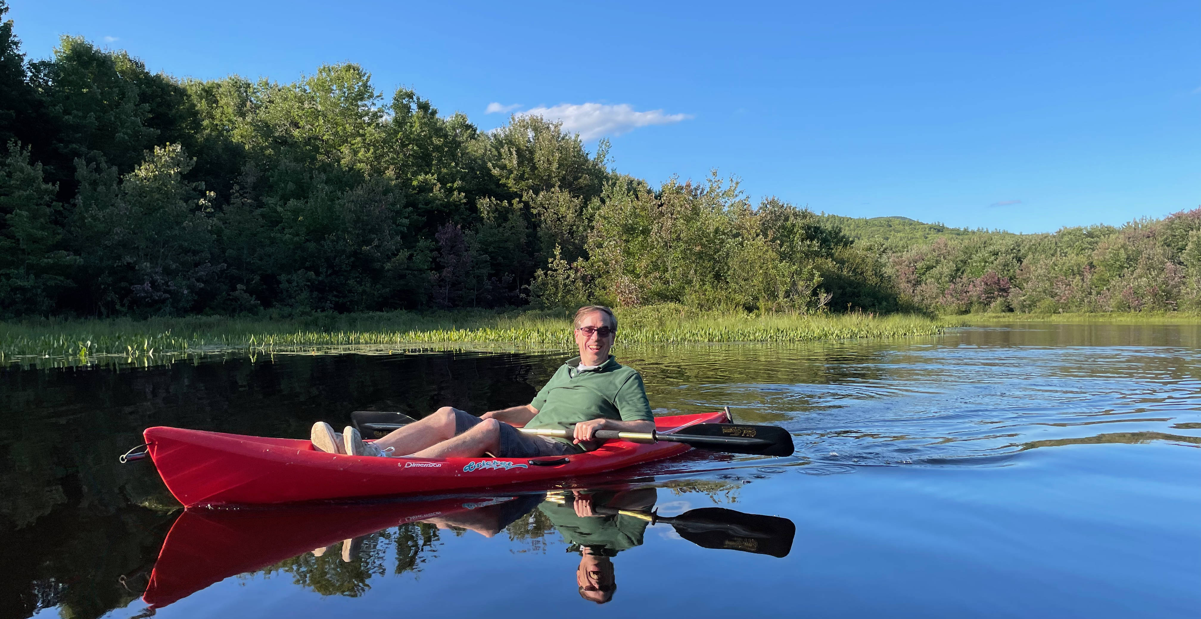 Ron Charles on Bog Pond in Andover, N.H. on Aug. 1, 2021. (Photo by Madeline Charles)