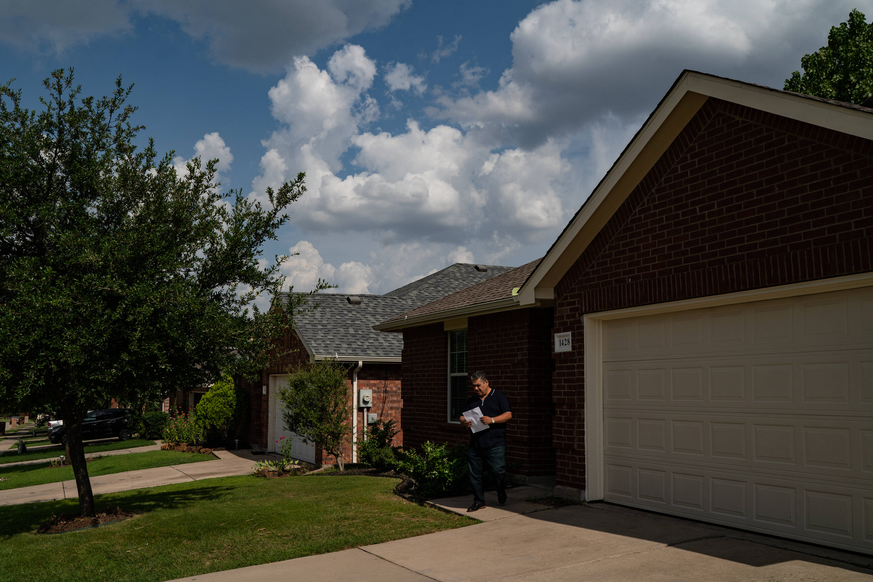 Omar al-Tememe, a real estate agent and community leader among the Iraqi Americans in Texas, shows a house. (Salwan Georges/The Washington Post)