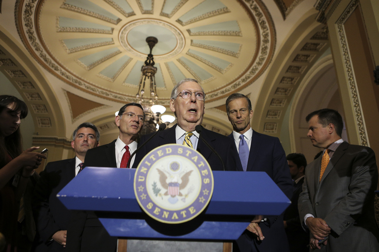 Mitch McConnell speaks to reporters at the Capitol. (Oliver Contreras/The Washington Post)</p>  
