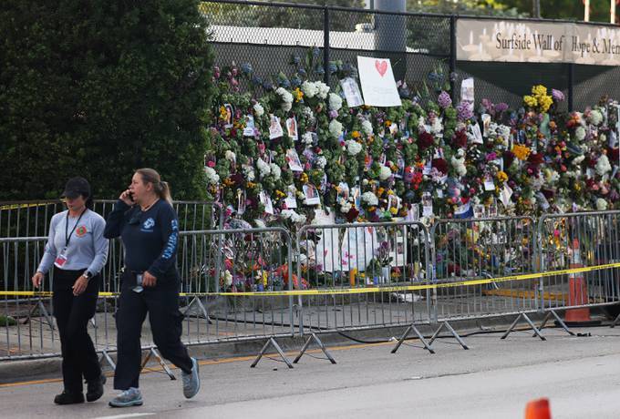 Flowers fill a memorial for those lost in the collapse. (Joe Raedle/Getty Images)
