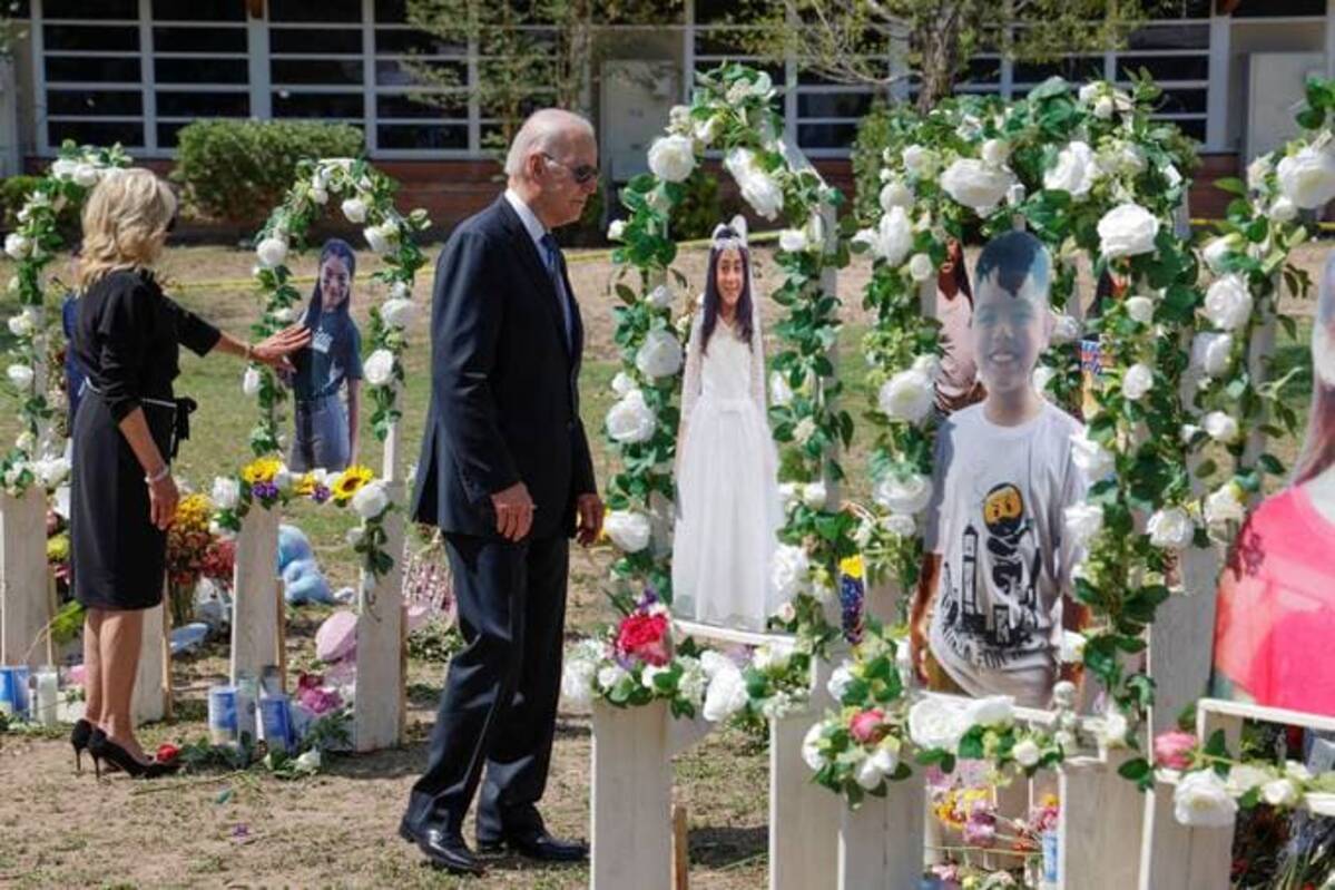 President Biden and first lady Jill Biden pay their respects at a memorial at Robb Elementary School in Uvalde, Texas, on May 29. (REUTERS/Jonathan Ernst)