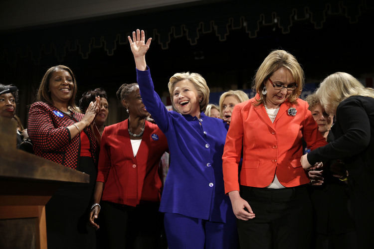 Clinton&nbsp;waves to the crowd during a Women for Hillary event in New York. (AP/Seth Wenig)</p>  