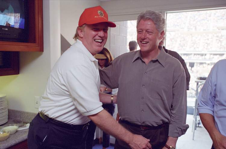 Donald and Bill laugh in happier days. This is another in the batch of Sept. 2000 photos&nbsp;released by the&nbsp;Clinton Library. (Via Reuters)</p>  