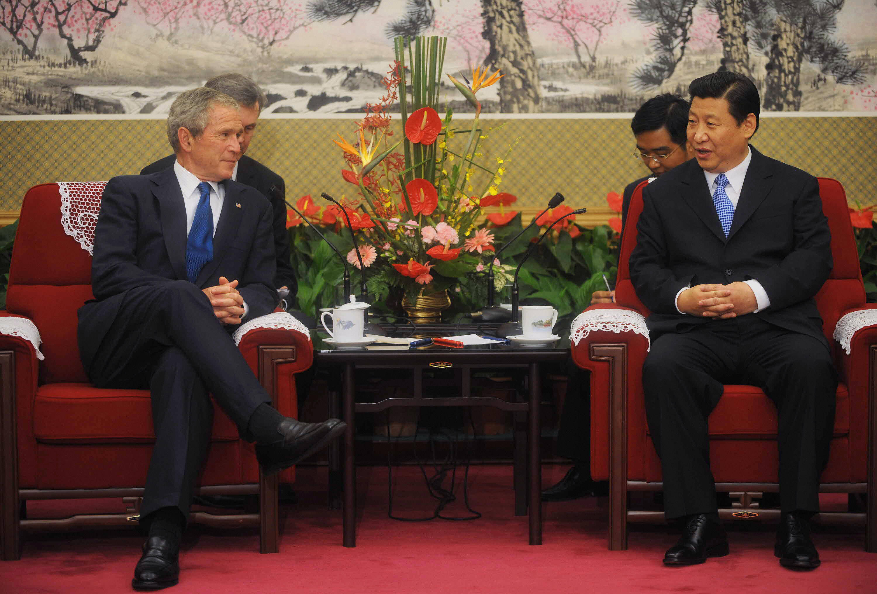President George W. Bush chats with then-Chinese Vice President Xi Jinping during a meeting in the Zhongnanhai compound in Beijing in 2008. (Mandel Ngan/AFP via Getty Images)