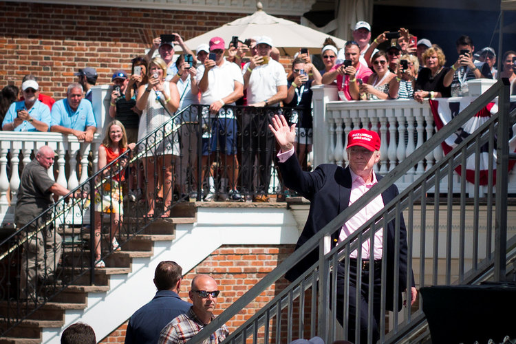 Trump waves to the crowd during the U.S. Women's Open golf tournament at his golf course in New Jersey. (Kelvin Kuo/USA Today Sports)  