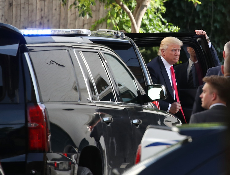 Donald Trump arrives at RNC headquarters for a meeting with Paul Ryan in July. The two have not posed for any photographs together this year. That will change today. (Mark Wilson/Getty Images)</p>  