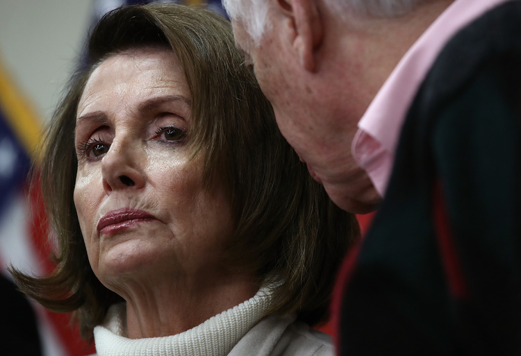 Nancy Pelosi confers with Steny Hoyer during the House Democratic caucus "Issues Conference" in Baltimore. (Win McNamee/Getty Images)</p>