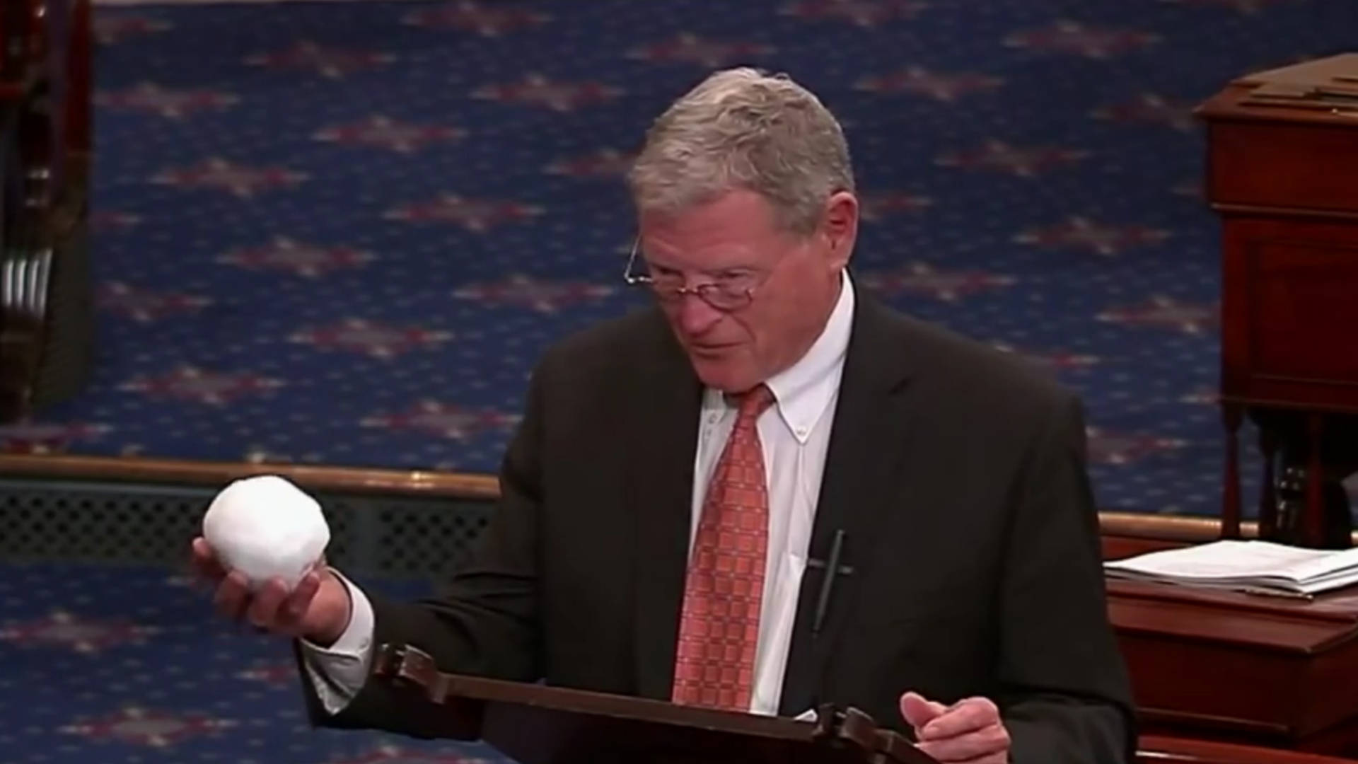 Sen. James M. Inhofe (R-Okla.) in 2015 threw a snowball on the Senate floor to argue climate change wasn't real. (C-SPAN)
