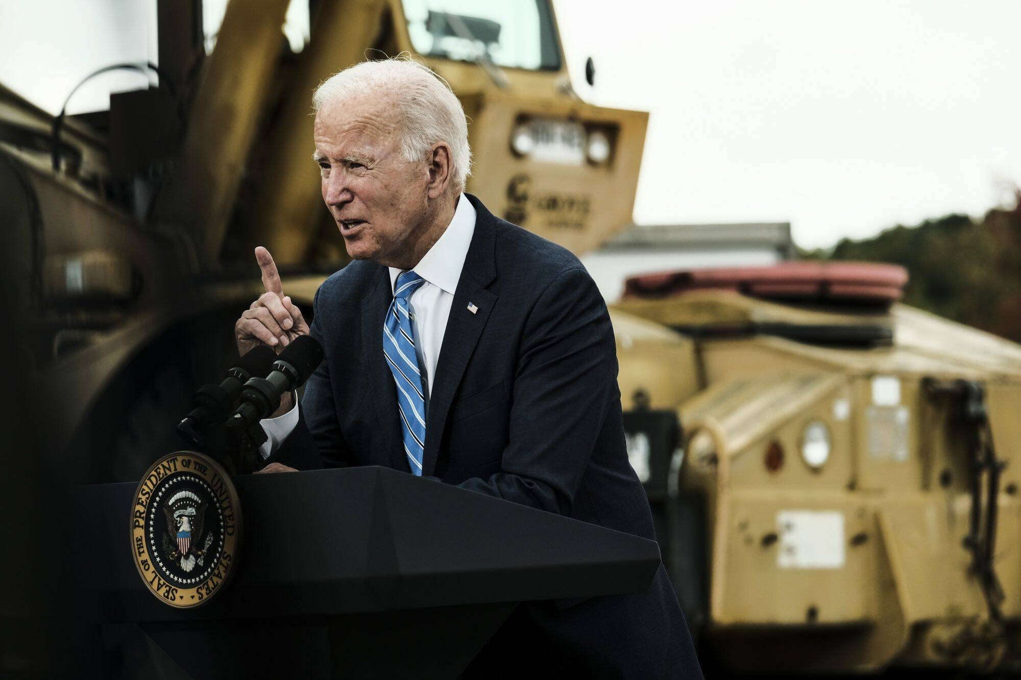 Biden in Michigan on Tuesday tried to sell Democrats' spending bill. (Matthew Hatcher/Bloomberg)