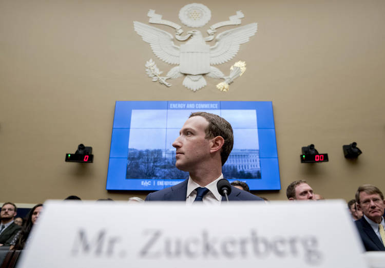Facebook CEO Mark Zuckerberg testifies before a House Energy and Commerce hearing last April. (Andrew Harnik/AP)  