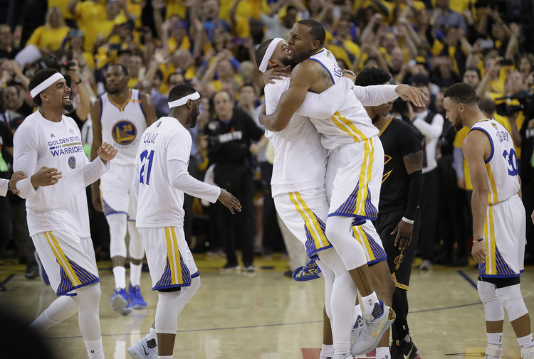 Golden State Warriors players celebrate after winning the NBA championship. (Marcio Jose Sanchez/AP)</p>  