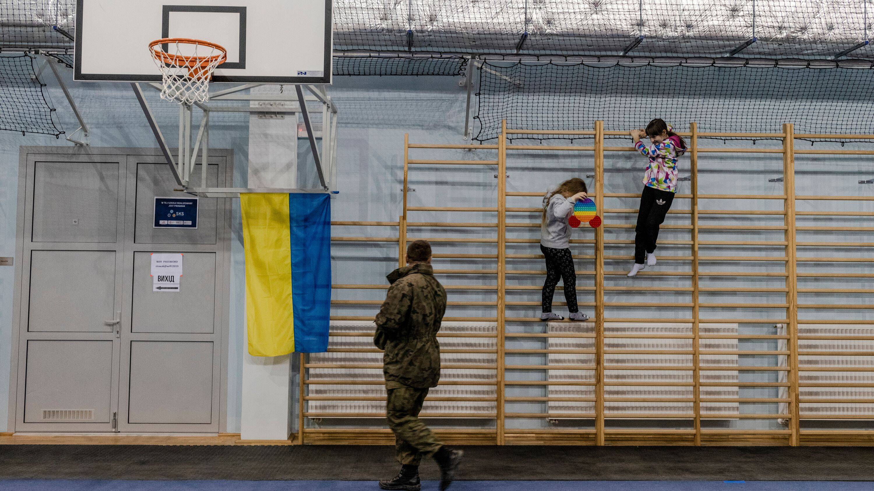 The new sports center at a high school in Przemysl, Poland, has been transformed into a reception center for refugees from Ukraine. (Kasia Strek for The Washington Post)