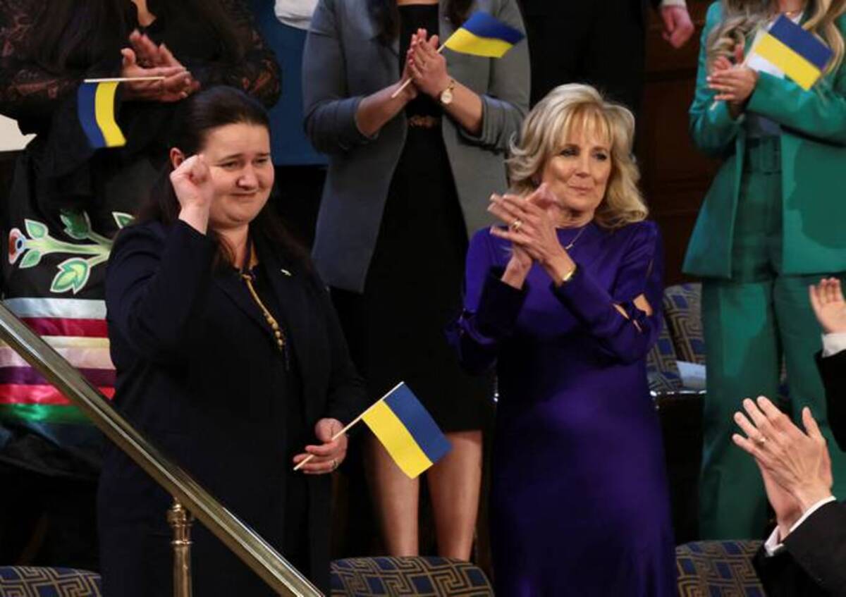 FLOTUS applauds her guest, Ukrainian Ambassador to the U.S. Oksana Markarova, in the first lady's box as President Joe Biden welcomes Markarova during his State of the Union address. (REUTERS/Evelyn Hockstein)