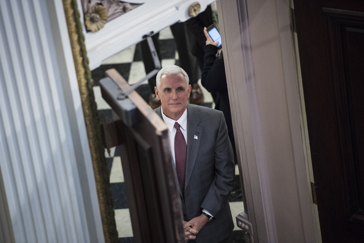 Mike Pence prepares to enter the Indian Treaty Room in the Eisenhower Executive Office Building at the White House last week. (Jabin Botsford/The Washington Post)</p>