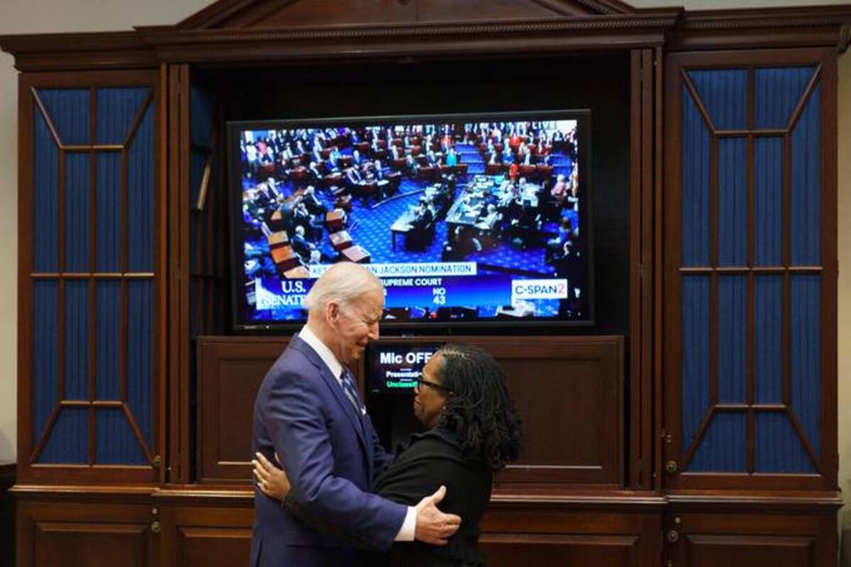 President Biden embraces Judge Ketanji Brown Jackson as they watch the Senate vote on her nomination to be an associate justice on the U.S. Supreme Court on Thursday. (Mandel Ngan/AFP via Getty Images)
