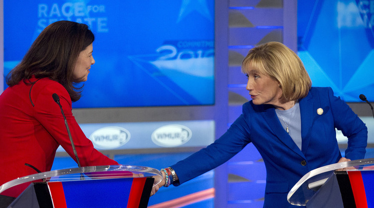 Kelly Ayotte and challenger Maggie Hassan shake hands following their final debate last Wednesday in Manchester, N.H. (AP Photo/Jim Cole, Pool)</p>  