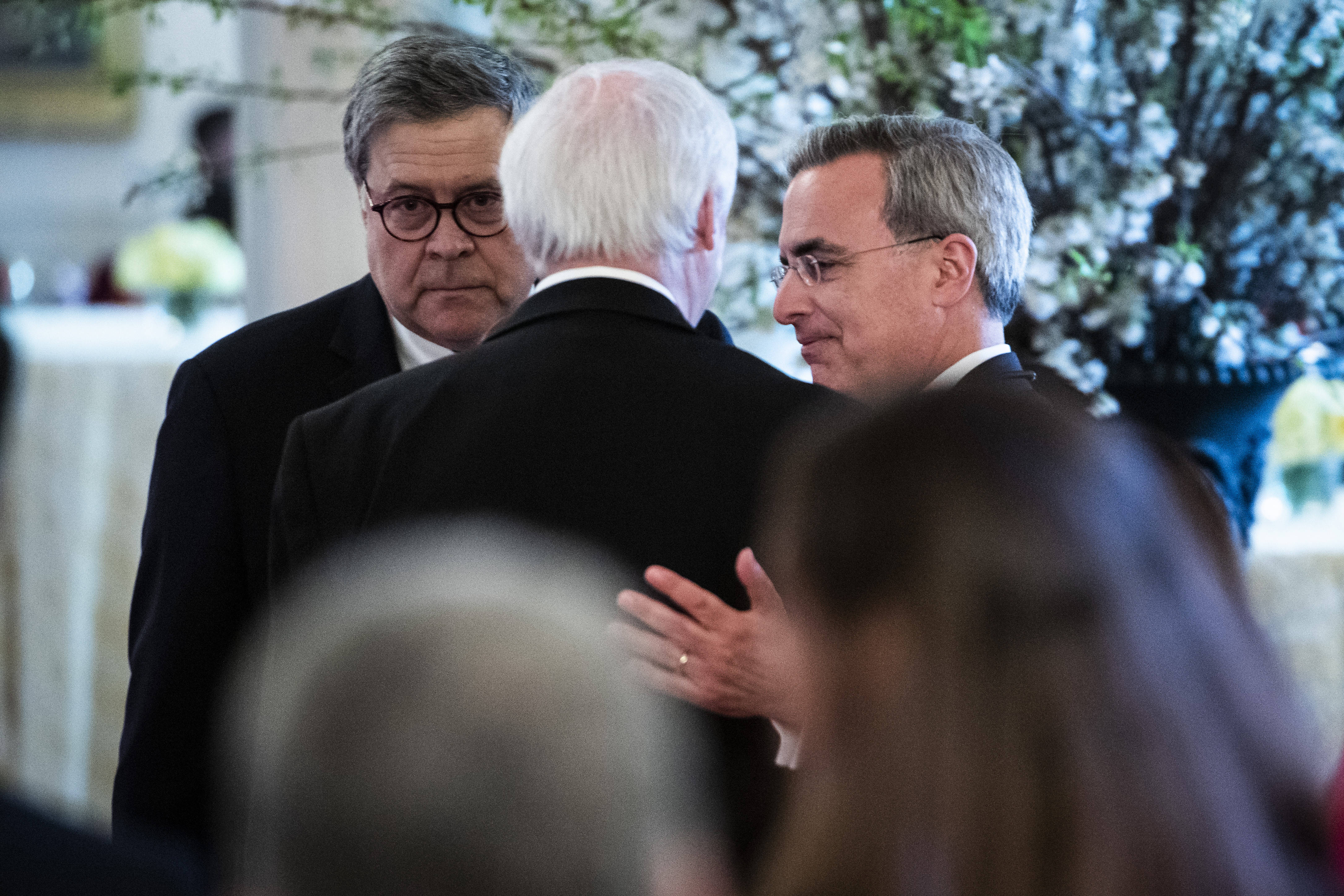 Then-Attorney General William P. Barr (left), White House Counsel Pat Cipollone (right) and Deputy Attorney General Jeffrey A. Rosen (center) at the White House in 2019. (Photo by Jabin Botsford/The Washington Post)