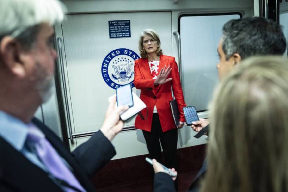 Sen. Lisa Murkowski (R-Alaska), speaks with reporters following a vote on Capitol Hill on April 5. (Jabin Botsford/The Washington Post)