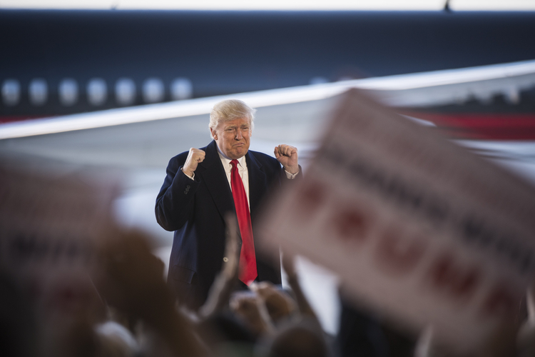 Trump at an airplane hanger in Wilmington, Ohio, on Friday. (Jabin Botsford/The Washington Post)</p>  