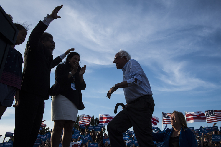 Sanders takes the stage at RFK Stadium last night.&nbsp;(Jabin Botsford/The Washington Post)</p>  