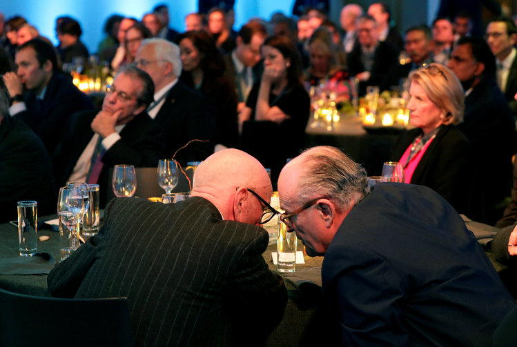 Rupert Murdoch, chairman of News Corp, quietly huddles with Rudy Giuliani at a Wall Street Journal event at the Four Seasons Monday night. (Joshua Roberts/Reuters)</p>  