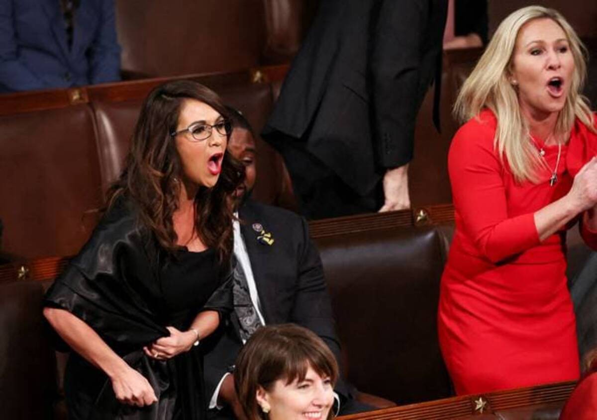 Rep. Lauren Boebert (R-Colo.) and Rep. Marjorie Taylor Greene (R-Ga.) scream "Build the Wall" during Biden's SOTU (REUTERS/Evelyn Hockstein)