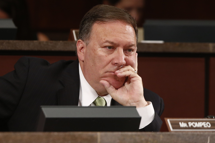 Mike Pompeo sits through a hearing on Capitol Hill. (Charles Dharapak/AP)</p>  