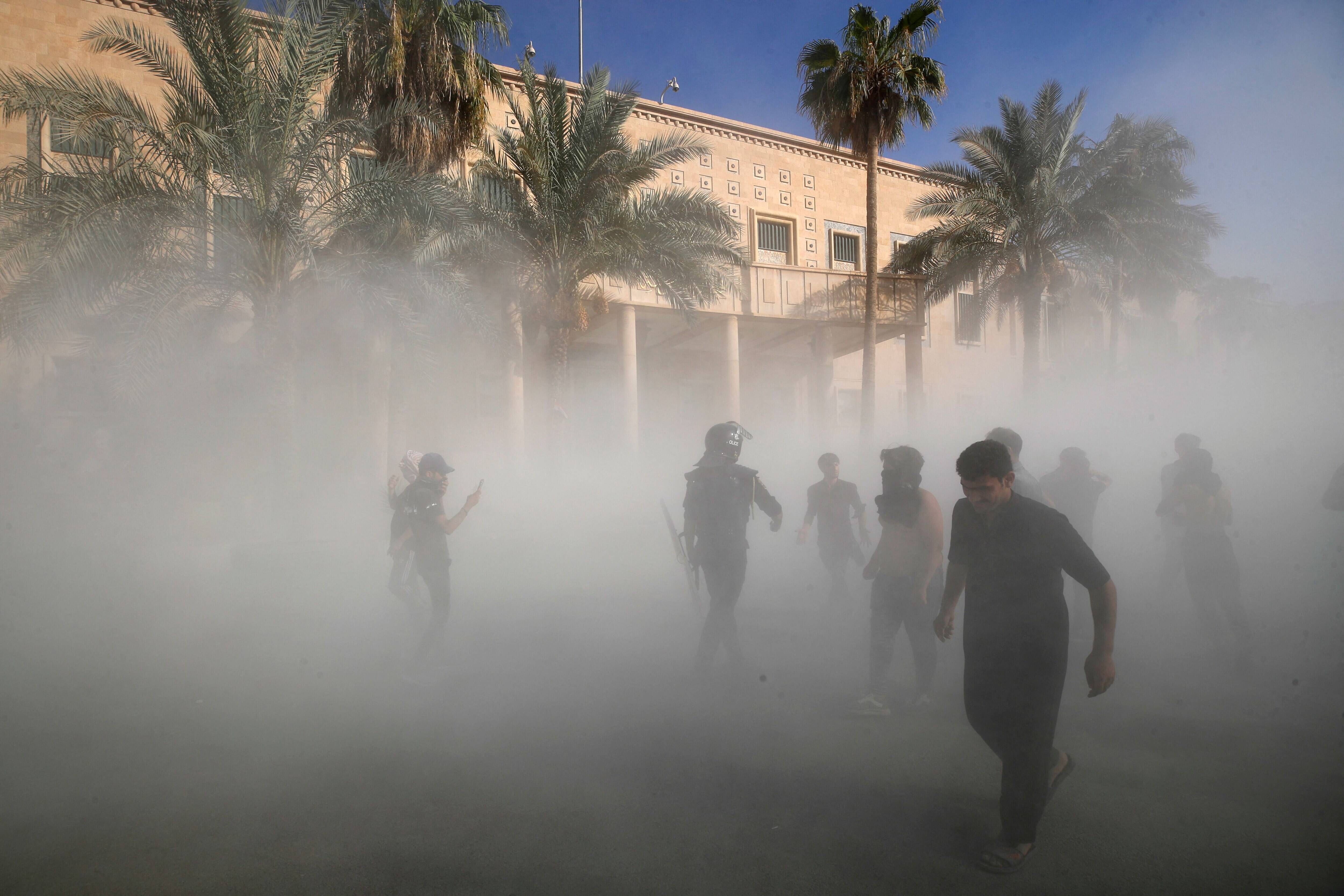 Supporters of Iraqi Shiite cleric Moqtada Sadr gather outside the Government Headquarters in the capital Baghdad's Green Zone, on Aug. 29, 2022. (Ahmad Al-rubaye / AFP via Getty Images)