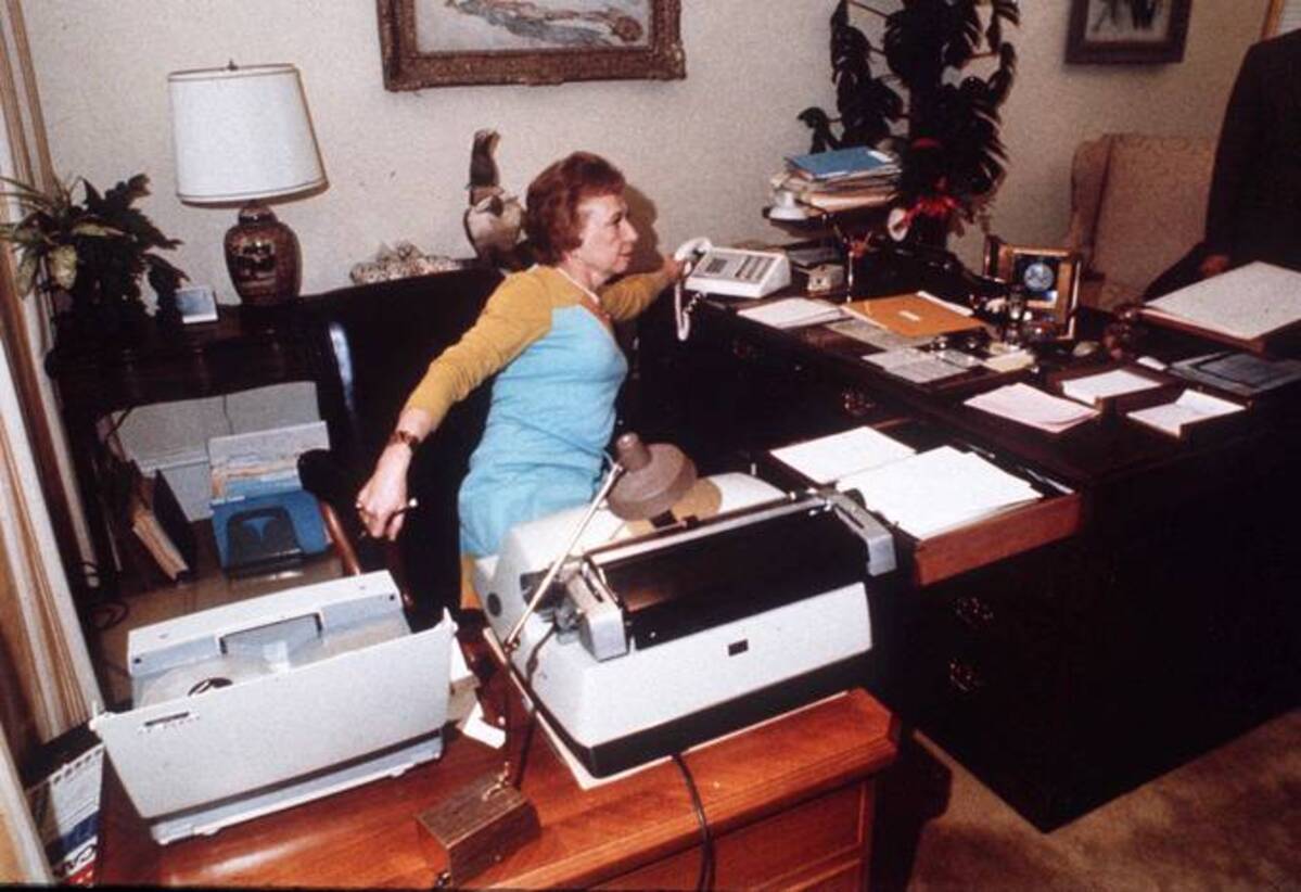 Rose Mary Woods, President Richard M. Nixon's secretary is shown at her White House desk in 1973, demonstrating the 