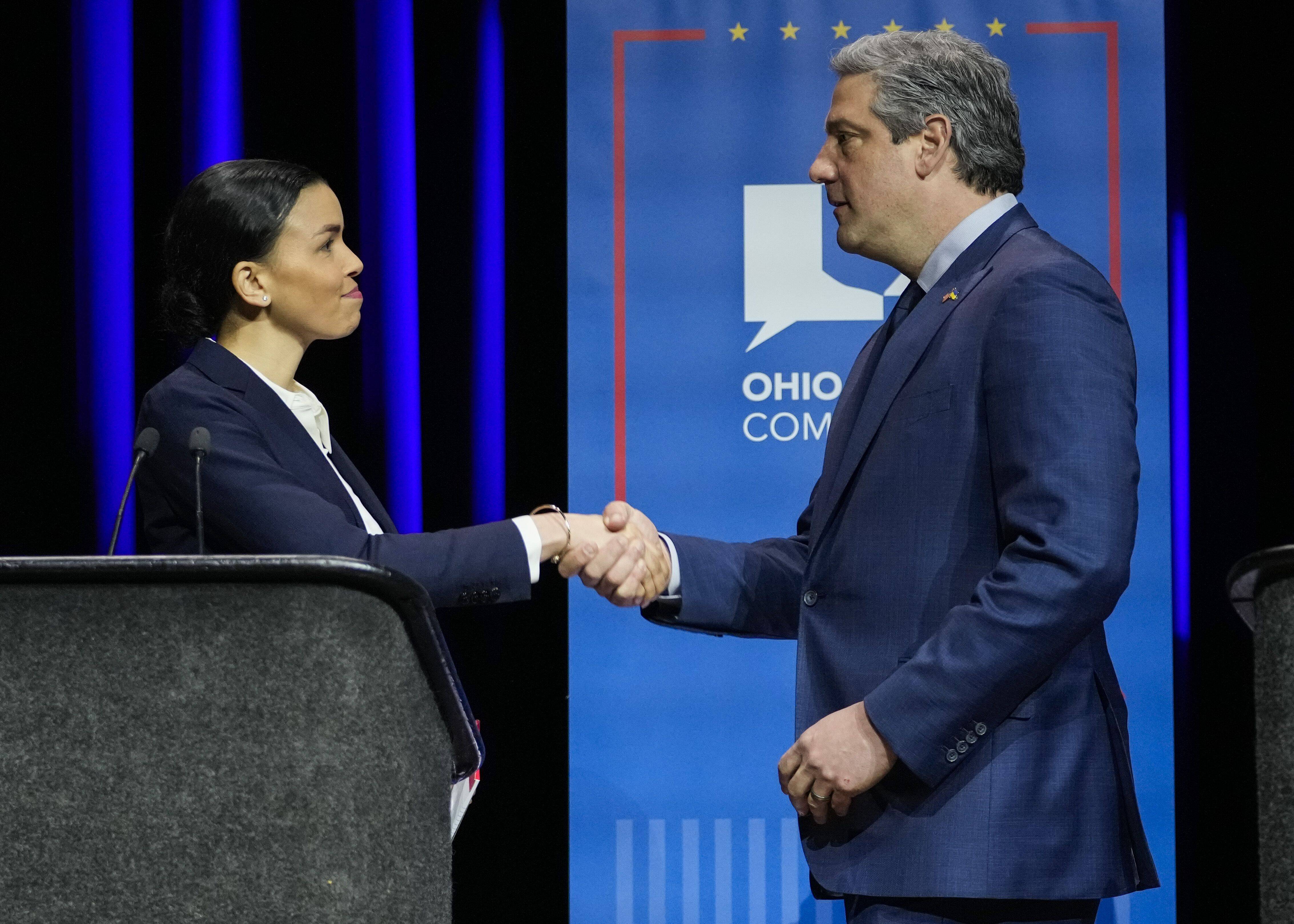 Morgan Harper, left, and Rep. Tim Ryan (D-Ohio) shake hands at the end of Ohio's U.S. Senate Democratic Primary Debate on March 28 at Central State University. (Joshua A. Bickel/The Columbus Dispatch)