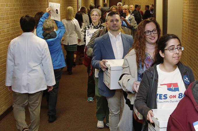 Supporters of Yes on 802 call in October 2019 for Medicaid expansion to be put on the ballot in Oklahoma. (Sue Ogrocki/AP)