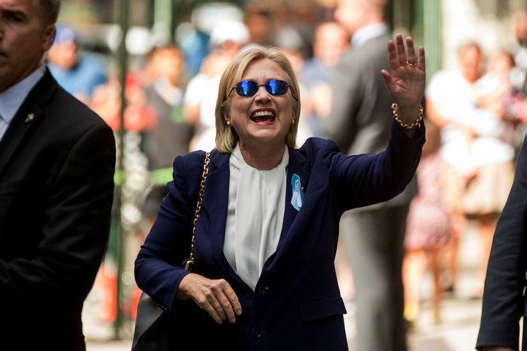 Hillary&nbsp;leaves Chelsea's apartment yesterday.&nbsp;(Andrew Harnik/AP)</p>  