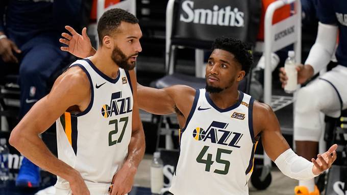 Donovan Mitchell (45) and Rudy Gobert (27) have had an up-and-down partnership in Utah. (Rick Bowmer/AP)