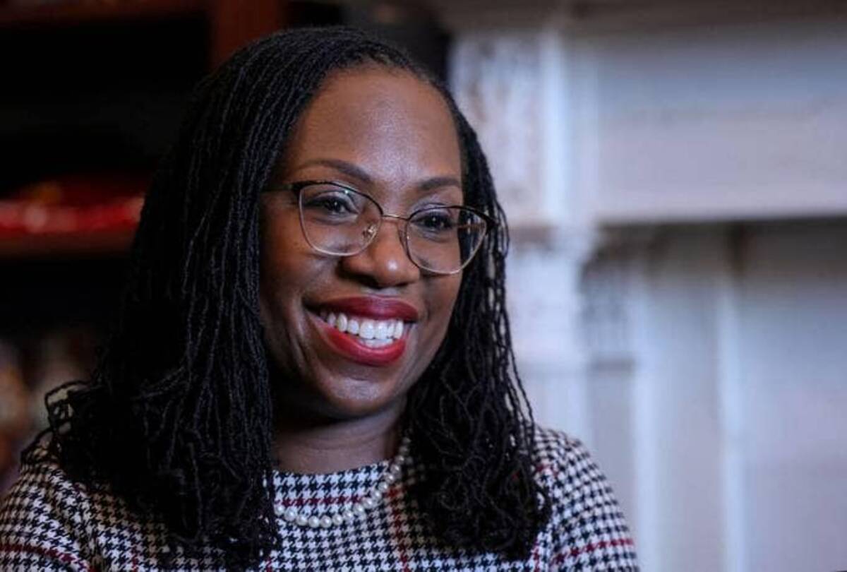 Supreme Court nominee Judge Ketanji Brown Jackson meets with Sen. Mitt Romney (R-Utah) in his office at the United States Capitol building on March 29. (Evelyn Hockstein/Reuters)