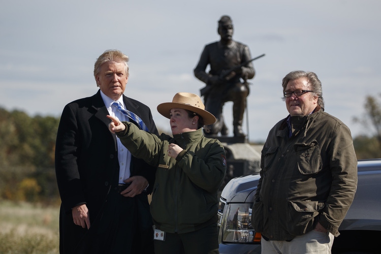 A park ranger gives a tour near the high-water mark of the Confederacy at Gettysburg National Military Park to Trump and Bannon on Oct. 22. (Evan Vucci/AP)</p>  