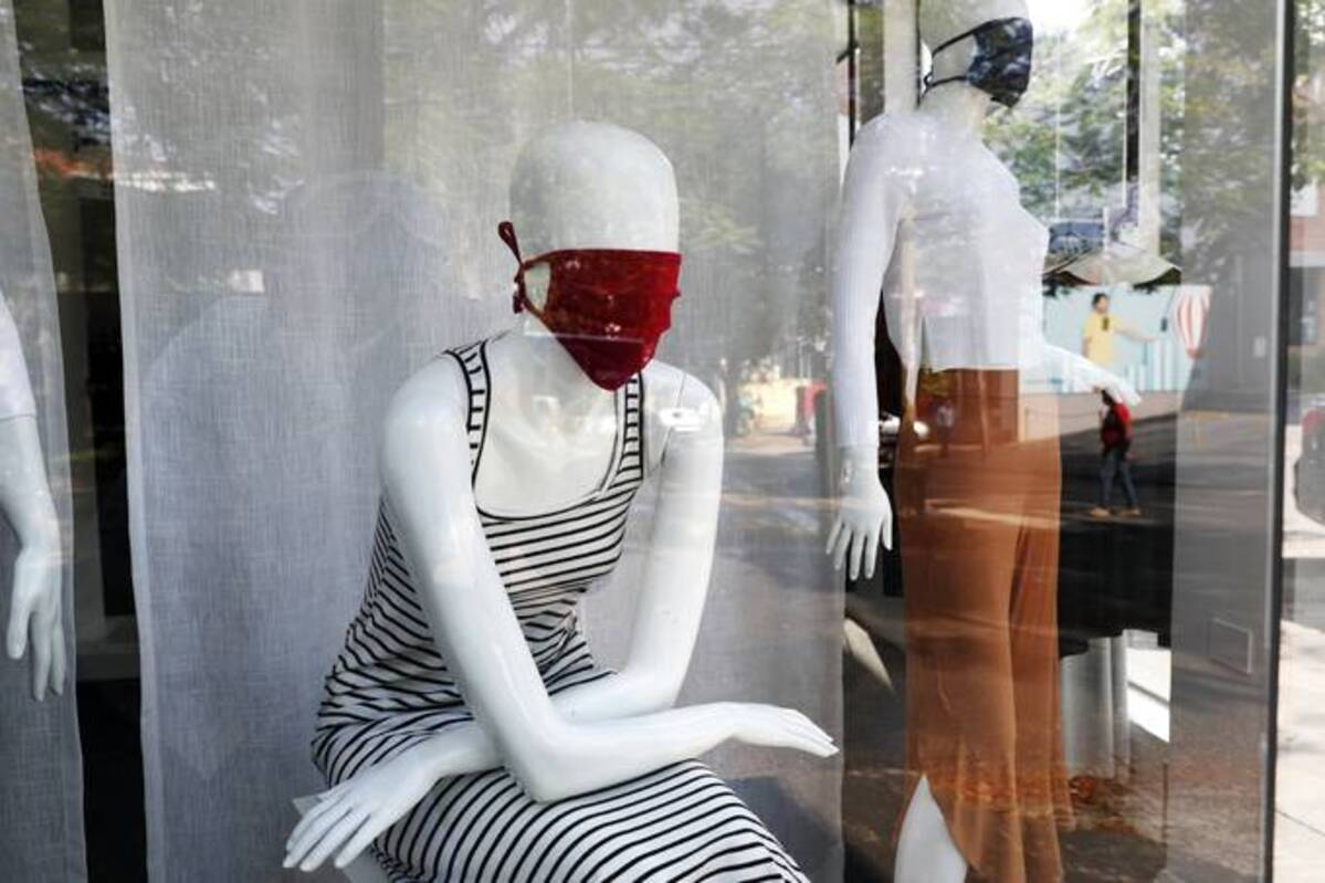 Mannequins wear masks. (Jorge Saenz/AP)