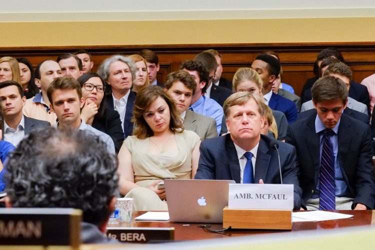 Natalia Veselnitskaya sits behind former U.S. ambassador to Russia Michael McFaul as he testifies before House lawmakers. (House Foreign Affairs Committee)  