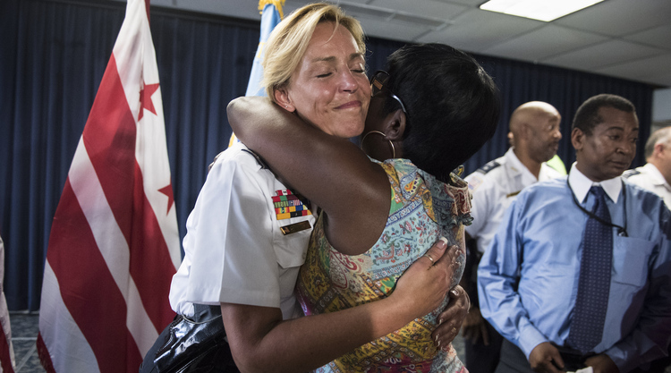 D.C. Police Chief Cathy Lanier greets friends and colleges after announcing her resignation. (Jabin Botsford/The Washington Post)</p>