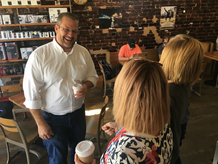 James Thompson, the Democratic candidate in Kansas's fourth congressional district, campaigns in Wichita. (David Weigel)</p>