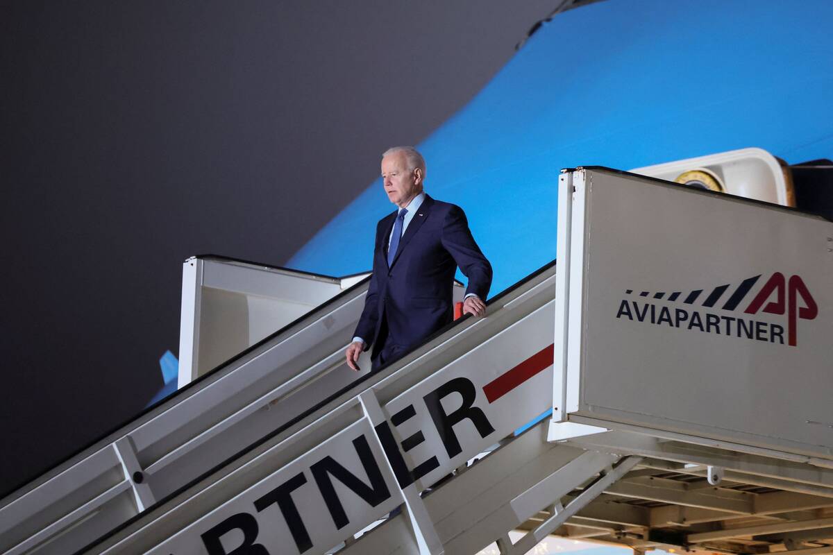 President Biden arrives in Brussels on March 23. (Evelyn Hockstein/Reuters)